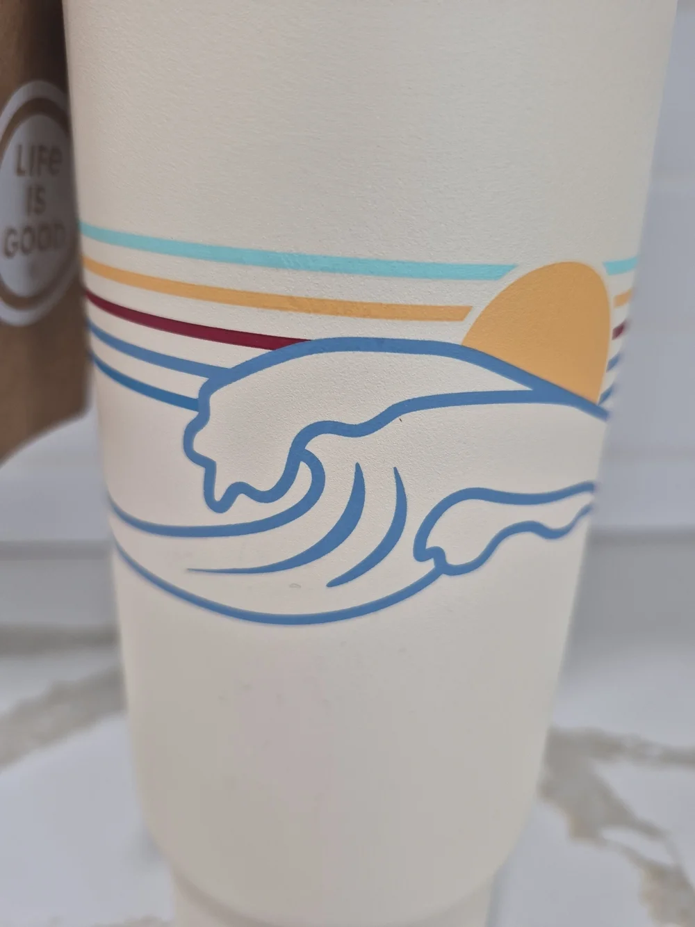 Life Is Good Cream Travel Tumbler with Rainbow Wave Stripe Handle